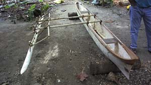 Finished canoe with rigger