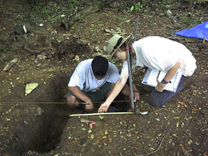 Lyndon and Dr. Beardsley working on the trench profile